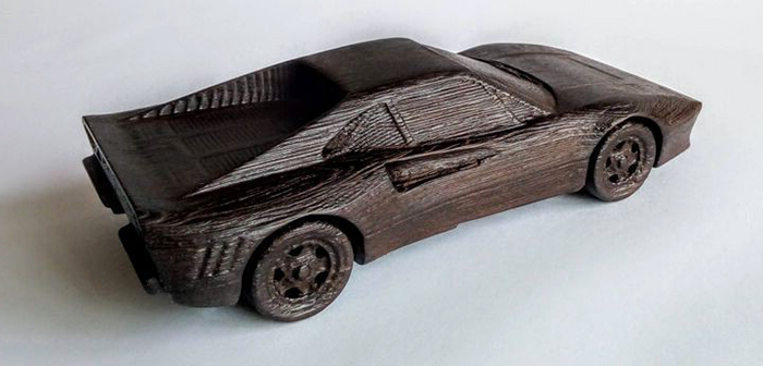 резная скульптура автомобиля из древесины венге